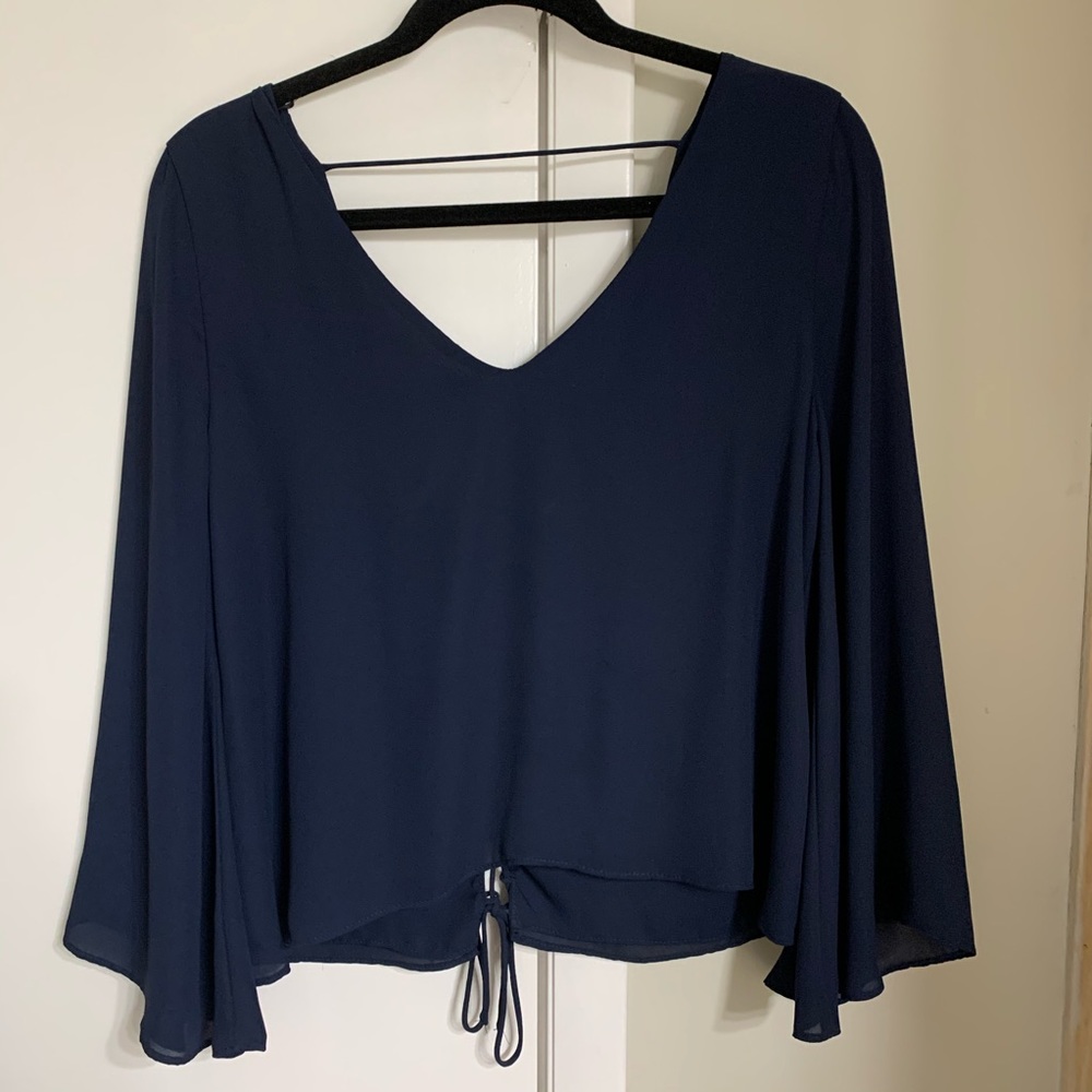 Beautiful lace-up back blouse